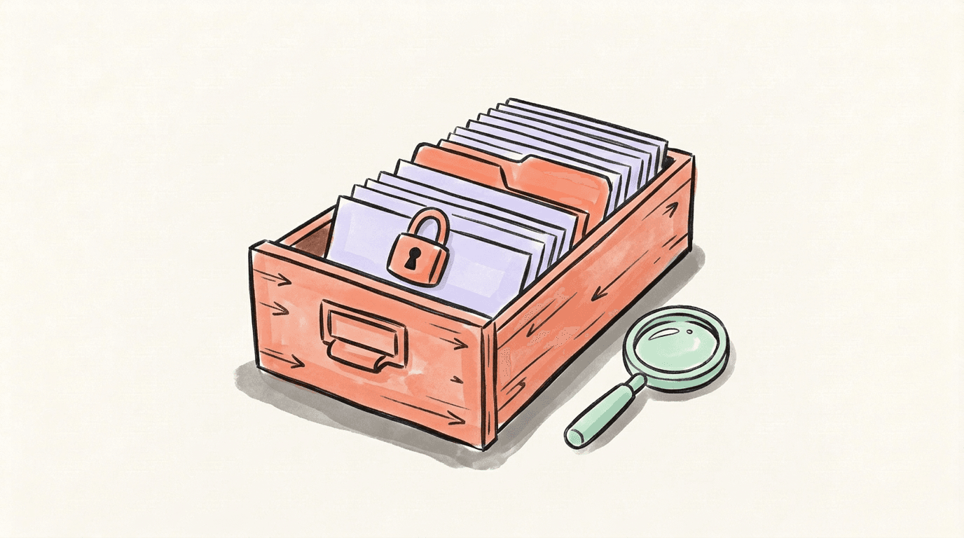 A wooden card-index drawer of lavender and coral cards, a padlock on the front card and a green magnifying glass beside the drawer